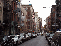 Bottom right picture you see a quiet street in Soho.  Soho is sandwiched between Greenwich Village to the north and TriBeCa & the downtown Financial District to the south.  Soho is also close to Chinatown and Little Italy. 