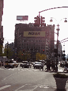 Center right picture is Greeley Square in front of Macy's Department Store.  This area is always packed with people shopping.