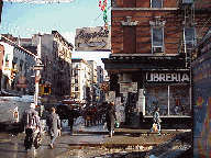 Center right picture you see some of the stores of Little Italy. A wonderland of cheese, breads, pastries and of course Italian wines!