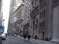 The Regent Wall Street Hotel is a must see (stay is better) when in NYC. The Regent Hotel is pictured in the distance with the flags. The Regent Hotel, which is a masterpiece in Greek Revival was once the Merchant Exchange.