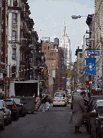 Top left picture you see Mulberry Street during lunch hour. In the far distance you see the Empire State Building.