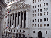 Wall Street in New York City is less than a mile long but it has a reputation that spans the world. Here is where you see the men in suits nervously smoking their cigarettes on the sidewalk during breaks from the trading floors.