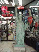 Another fact about success is that once you make it...everyone imitates! Top left photo you see the Statue of Liberty as seen in a souvenir shop on 8th Avenue in Hell's Kitchen.