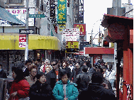 Center right you see a constant in NYC - busy people. Picture of Centre Street and Canal Street in Chinatown.