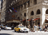 Center right photo you see the entrance to the St. Regis Hotel on Fifth Avenue.  As far as we know there isn't any connection between the name of this famous hotel and Regis Philbin.  Regis isn't a saint either, but keep passin' out millions Reg!