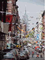 Top right picture you see the Empire State Building as seen from Mulberry Street. The decorations change from time to time. Top left picture you see colorful buildings where you'll find great stores selling Italian cheeses and pastries.