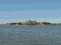 Top left picture you see a distant shot of Ellis Island as seen from a Circle Line Cruise ship.