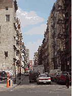 Top right photo you see the cast-iron buildings of Soho which are seen from Canal Street in Chinatown.