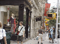 Back down on the streets, center right picture you see West Broadway in Soho.