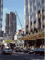 Bottom right picture you see the side view of Trump International Hotel and Tower. In the distance you see the cranes and construction on One Central Park, the new home of AOL Time Warner.