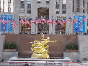 Top right you see the gold statue in the center of Rockefeller Center. Of course if you watch the NBC Today Show you see this every morning. You'll notice the American flags in the background. Like most areas of the country, NYC is covered in flags.