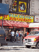 Center right picture you see the Carnegie Deli at 854 7th Avenue on the West Side.  This is one of New York's most famous delis.  Whatever you do go here really hungry.  The sandwiches are big enough to feed an entire family.  This place is awesome!