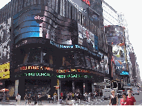 Center right photo you see the ABC sign on Broadway.  Watch Peter Jennings here.