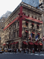Center right picture you see the Cartier Building on Fifth Avenue. This building was undergoing a face lift for a long time. We're happy to see it's all wrapped up and ready for Christmas.