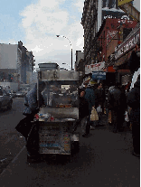 You can always get yourself a hotdog and soda on most any corner for a buck or so.  We don't know why you would want to do this, with all of the great Chinese food around.  Top right you see a hotdog vendor on Canal Street.