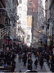 Top right picture you see Nassau Street.  Nassau Street is closed off to traffic.  Walking the cobblestones on Nassau Street you  experience a real New York feeling as you mingle in the crowds.  The entire street is lined with stores and shops.