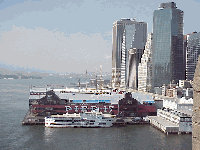 Center right picture you see South Street Seaport and Pier 17.  Here you can visit the South Street Seaport Museum and shop in the huge mall on the pier.  There are plenty of seafood restaurants for dining and what a view!