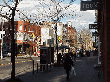 Bottom right picture you see West Broadway in Soho. This is where you'll want to visit for designer shopping, art galleries and great restaurants.  On nice days some of the artists that haven't made it big time will sell their artwork on the sidewalk.