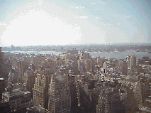 Bottom right picture you see a view of the skyline of NYC (view west downtown area ). This shot was taken from the Hilton Hotel on 42nd Street.  That's the Hudson River and New Jersey in the distance.