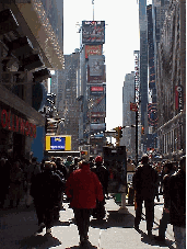 Top right picture you see a street level view of Broadway in Times Square.  Times Square is so entertaining.  You'll see plenty of street entertainment and sometimes you'll pass by stars being interviewed on the sidewalk. The signs are very eye catching.