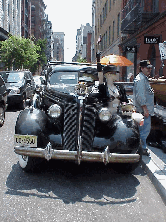 Center right picture you see an antique car used as a backdrop for selling merchandise.  Getting attention in NYC isn't easy.