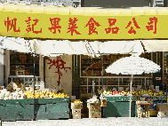Market in Chinatown selling fresh fruit and vegetables