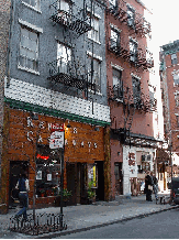 Kenny's Castaways to the left and Back Fence to the right on Bleecker Street in Greenwich Village