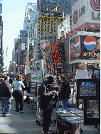 Here you see sidewalk vendors selling photos of NYC on the street