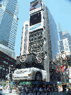 Cadillac advertisement in the middle of Times Square and Broadway