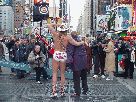Naked Cowboy in the middle of Broadway in Times Square
