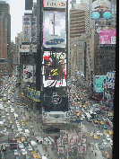 Second picture you see the big Cadillac car and the Coke sign in the middle of Broadway.
