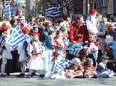 Crowds at the Greek Independence Day Parade in NYC Pictures featuring American Greeks marching on 5th Avenue at the Greek Independence Day Parade 2004.