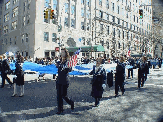 Flag for the 2004 Olympic Games Athens Greece Pictures featuring American Greeks marching on 5th Avenue at the Greek Independence Day Parade 2004.