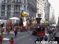 Osh Kosh Choo-Choo Train Rounding the Bend Photo 75th Annual Macy's Thanksgiving Day Parade Pictures on 34th Street New York, NY. Images of NYC Parade Floats and Balloons.